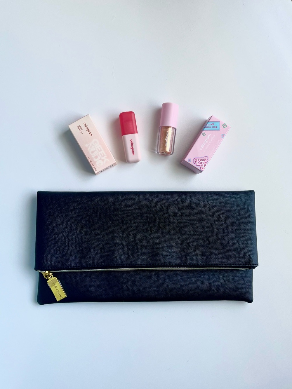🆕 3 Piece Beauty Products ESTEE LAUDER Black Clutch with Gold Zipper closure.